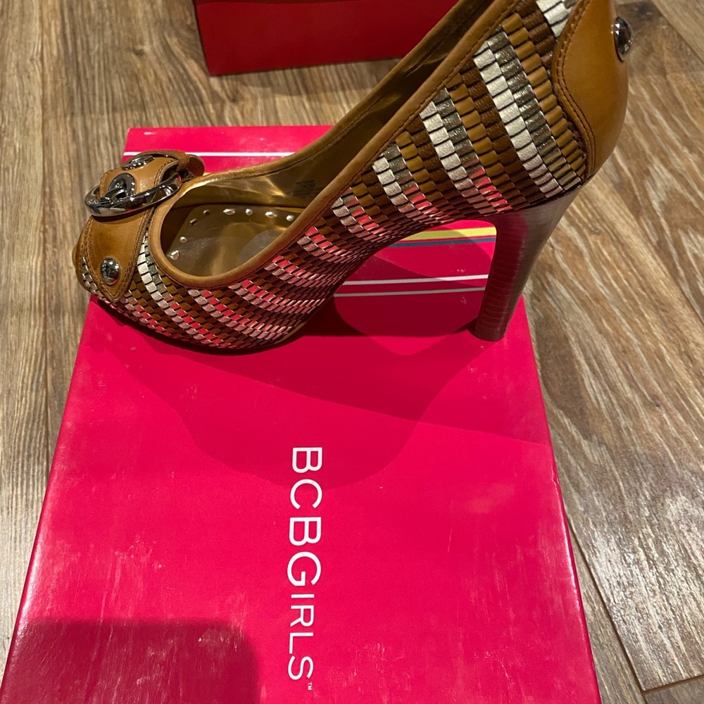 New open toe heels Around 2 inches high with a silver buckle on the front